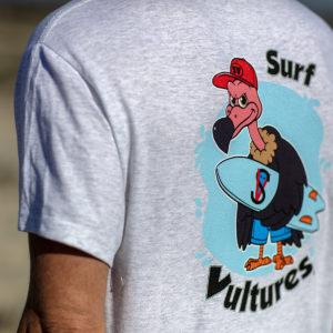 Man wearing light grey t-shirt with SurfVulture logo